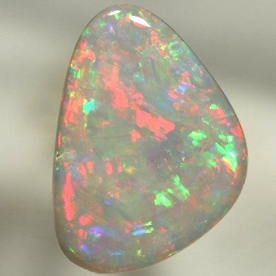 SOLID SEMI BLACK OPAL Sparkling bright red and green jumping over each other